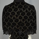 Mantelet with lappet tails in black voided velvet, 1880s, back view