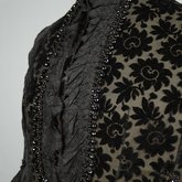 Mantelet with lappet tails in black voided velvet, 1880s, detail of trim