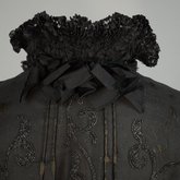 Cape with black silk faille and jet bead embroidery, 1890s, detail of collar frill exterior