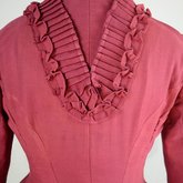 Housedress, cranberry red wool with self-trims, 1880s, detail of back pleats