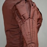 Wedding dress, maroon silk faille with sleeve puffs, 1893, detail of sleeve puff