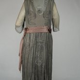 Dress, dark olive chiffon with brown satin sash over brown satin foundation, c. 1922, back view