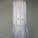 Dress, sheer lavender silk chiffon with silver and white beads and rhinestones, c. 1926, back view