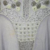 Dress, sheer lavender silk chiffon with silver and white beads and rhinestones, c. 1926, detail of skirt beading