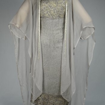 Dress, gray silk satin with a netted silver bead overlay and gray chiffon panels, 1921-1925, front view