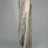 Dress, gray silk satin with a netted silver bead overlay and gray chiffon panels, 1921-1925, side view