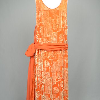 Dress, sheer orange silk chiffon with voided cream velvet pile, 1920s, front view