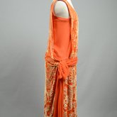 Dress, sheer orange silk chiffon with voided cream velvet pile, 1920s, side view