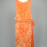 Dress, sheer orange silk chiffon with voided cream velvet pile, 1920s, back view