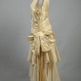 Dress, cream taffeta with a diagonal double-flounced skirt, 1928-1930, side view