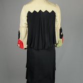Dress, black silk charmeuse with cream silk yoke and sleeves, 1928, back view
