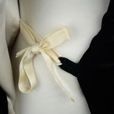 Opera coat, black silk velvet with dolman sleeves, 1930s, detail of interior tie