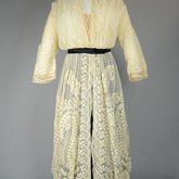 Dress, embroidered voile over a black silk satin skirt, 1910s, front view