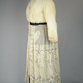 Dress, embroidered voile over a black silk satin skirt, 1910s, quarter view