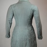Coat, teal wool with cordwork, 1910-1915, back view