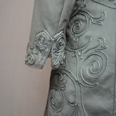 Coat, teal wool with cordwork, 1910-1915, detail of cuff