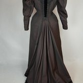 Aesthetic or reform dress in wine red and black ribbed silk and wool, c. 1892, back view
