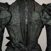 Dress, black leaf-patterned silk over mint green cotton, c. 1898, detail of back