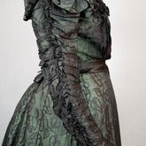 Dress, black leaf-patterned silk over mint green cotton, c. 1898, detail of sleeve