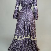Dress, silk printed with purple, with black and white trim, c. 1904, back view
