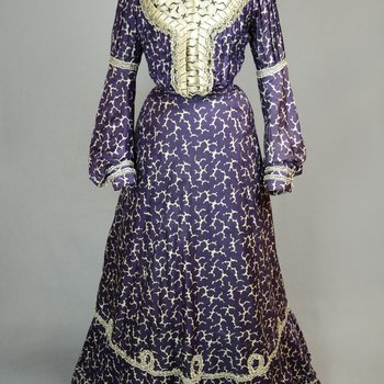 Dress, silk printed with purple, with black and white trim, c. 1904, front view