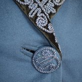 Wedding suit, blue wool with cord-work 1909, detail of button and collar