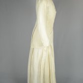 Suit, white linen, cutaway jacket and ankle-length skirt, c. 1912, side view