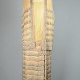 Sheath dress with vest, sleeveless, pale gold and tangerine chiffon with rows of bugle beads, c. 1923, front view