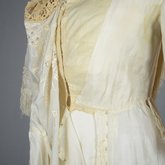 Dress, white silk with embroidery and fringe, 1910s, detail of dress opening