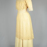 Dress, cream silk faille with ecru embroidered net, c.1910, side view