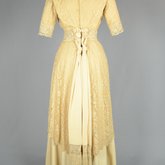 Dress, cream silk faille with ecru embroidered net, c.1910, back view