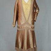 Dress, dark gold charmeuse with reverse of fabric as contrasting trim, 1920s, quarter view