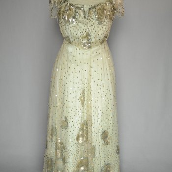 Evening gown, Marie Lamy of Paris, ice blue silk satin with a paillette-strewn bobbinet overlay, 1908-1915, front view