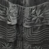 Suit, black ottoman silk trimmed with Maltese crosses and tassels of silk-wrapped beads, 1915-1917, detail of skirt trim