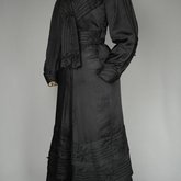 Suit, black ottoman silk trimmed with Maltese crosses and tassels of silk-wrapped beads, 1915-1917, side view
