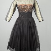 Cocktail dress, black point d’esprit with lace over black rayon lining, 1950s, front view
