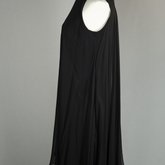 Cocktail dress, sleeveless A-line with black crepe and black chiffon overlay, with a rhinestone collar, 1960s, side view