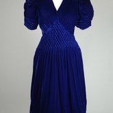 Dress, blue velvet with smocked waist and shoulders, 1938, front view