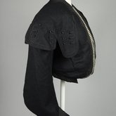 Jacket, black wool with large scalloped revers, pouched front, and topstitched silk trim, c. 1902, side view