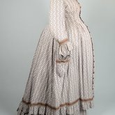 Housedress, cotton printed with a brown geometric pattern, separate underskirt, c. 1875, able to accommodate pregnancy