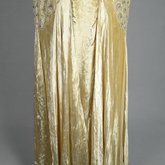 Evening dress, cream panne velvet with rhinestones and embroidery, 1929, back detail of floating skirt panels
