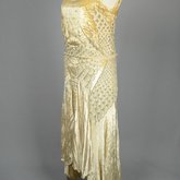 Evening dress, cream panne velvet with rhinestones and embroidery, 1929, quarter view