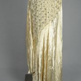Evening dress, cream panne velvet with rhinestones and embroidery, 1929, side detail of floating skirt panels