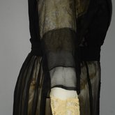 Dress, House of Worth, black silk chiffon and cream silk satin with cream lace, 1910-1915, detail of sleeve