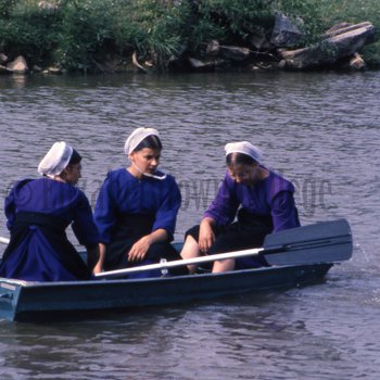 Amish women in row boat