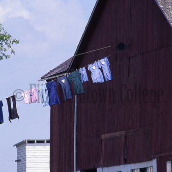 Amish clothesline in front of barn