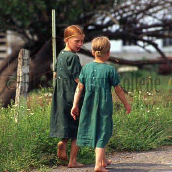 Two Amish girls walking