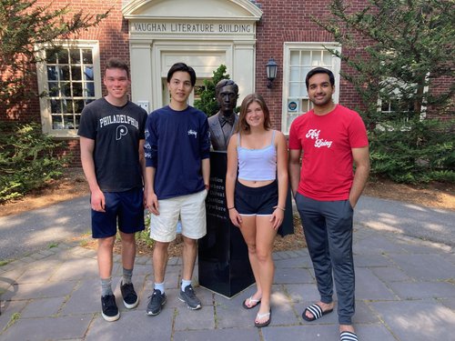 2023 DSSRF Cohort:  From left to right, Danny Nolan, Omid Mohammadi, Emilia Blechschmidt, Muhammad Ahmad stand in front of the Vaughan Literature Building.