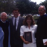 1992 Lynn Commencement: Ross and Hannifan present Distinguished Alumni Award to Joseph and Mary Veccia