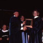 1992 Lynn Commencement: J. Donald Wargo presents the President's Award to Leslie Alice Kent